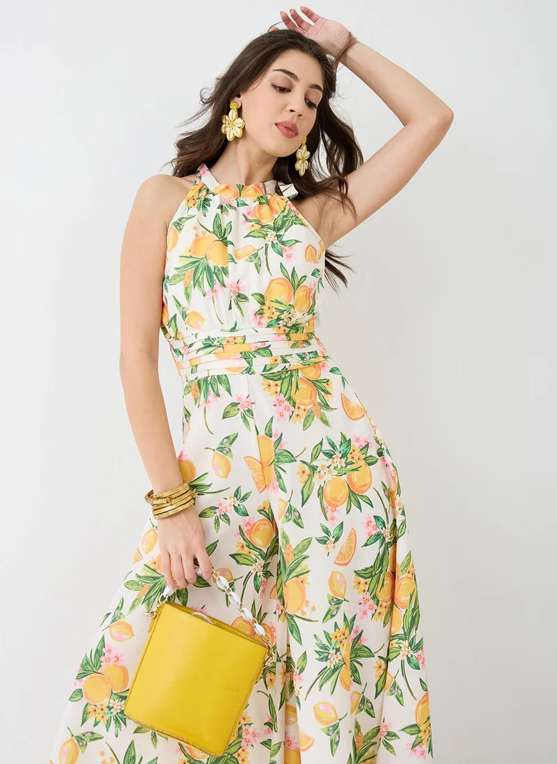 globus Yellow Globus Women Yellow Floral & Fruit Print Halter Neck Pleated Detail Flared Fusion Jumpsuit for Women | Best Price UAE